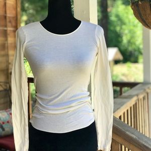 Creme colored long sleeve top